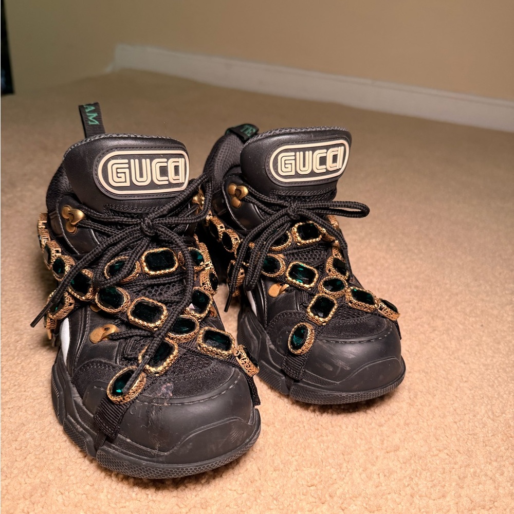 Gucci Flashtrek - black leather and mesh. Removable Green Crystal Embellishments